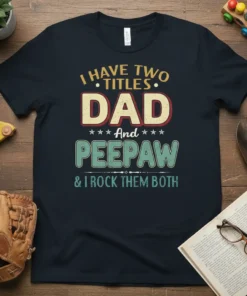 I Have Two Titles Dad And Peepaw & I Rock Them Both text design on a dark navy t-shirt, vintage
