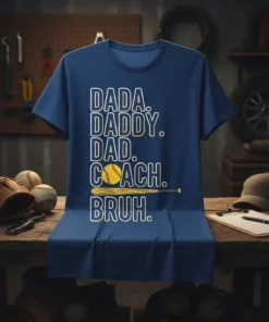 Navy blue t-shirt with "Dada. Daddy. Dad. Coach. Bruh." text and baseball graphic