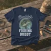 Daddy's Fishing Buddy T-Shirt design with a leaping bass fish and text in vintage style