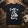 Daddy's Garage Buddy t-shirt with distressed white text and a graphic of a hand holding a wrench within a gear
