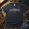 Navy blue t-shirt with "DADGUMMIT!" in distressed red and yellow lettering, featuring gears and tools graphic