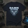 Damn I'm Good text with a metallic eagle emblem on a navy t-shirt
