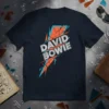 Navy blue t-shirt with "DAVID BOWIE" in white and grey text across a stylized orange and teal lightning bolt graphic
