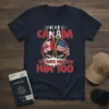 T-shirt with "Dear Canada We Hate Him Too Him Too" text, Canadian and US flags, and crossed hockey sticks graphic
