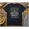 Deck The Halls With Matzo Balls Hanukkah T-Shirt featuring festive text and menorah graphics