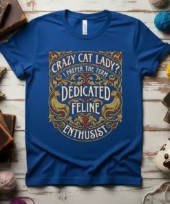 Crazy Cat Lady? I Prefer The Term Dedicated Feline Enthusiast text design on a blue t-shirt with ornate borders and