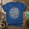 Deja Tu Lo Guapo Soy Tico text with coffee beans and palm tree graphics on a blue t-shirt