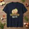 Deviled Egg Co. text and graphic of two deviled eggs on a navy t-shirt