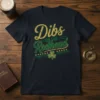 Navy t-shirt with "Dibs on the Redhead" text in gold and green, featuring a shamrock graphic