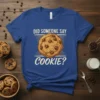 Did Someone Say Cookie? text with a chocolate chip cookie graphic on a royal blue t-shirt