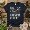 DIG. Plant. HARVEST. REPEAT. quote on a navy t-shirt, with gardening graphics and text