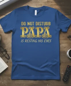 Blue t-shirt with gold text "DO NOT DISTURB PAPA IS RESTING HIS EYES" for Father's Day gift