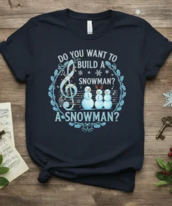 Do You Want To Build A Snowman? Christmas t-shirt with musical notes, snowmen, and treble clef graphic