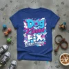 Dog Kisses FIX EVERYTHING text design with paw prints and hearts, vibrant graffiti style on a blue t-shirt