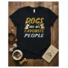 Black t-shirt with yellow and white text saying "Dogs Are My Favorite People" and dog graphics