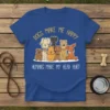 Dogs Make Me Happy Humans Make My Head Hurt t-shirt with a cartoon illustration of various dog breeds