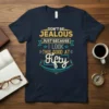 Don't Be Jealous Just Because I Look This Good At Fifty text design on a navy t-shirt, featuring vintage-style typography