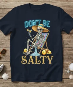 Don't Be Salty t-shirt design with a skeleton relaxing on a beach chair holding a drink