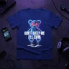 Don't Bully Me I'll Cum teddy bear graphic tee with neon accents and red glowing eyes