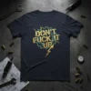 Don't Fuck It Up bold golden text design with lightning graphic on dark t-shirt