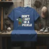 Don't Get In A Pickle T-Shirt with cartoon pickle in baseball gear and distressed text