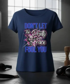 Don't Let the Pretty Face Fool You quote in bold blue and pink typography on a navy t-shirt, with a