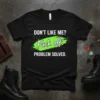 Black t-shirt with bold white text: "DON'T LIKE ME? Fuck off. PROBLEM SOLVED." with a vibrant green brush stroke graphic