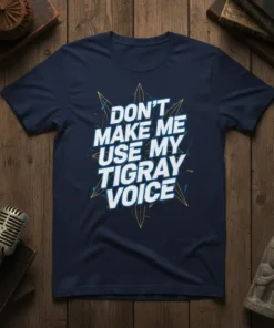 Navy t-shirt with bold white text "DON'T MAKE ME USE MY TIGRAY VOICE" in a striking design, featuring blue and
