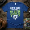 Brother sister protective quote "Don't Mess With My Sister That's My Job" with a roaring bear graphic on a blue