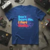 Don't Scare Me. I Fart Easily. text design on a blue t-shirt with circuit board graphic elements