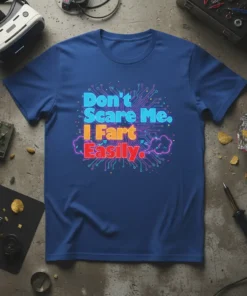 Don't Scare Me. I Fart Easily. text design on a blue t-shirt with circuit board graphic elements