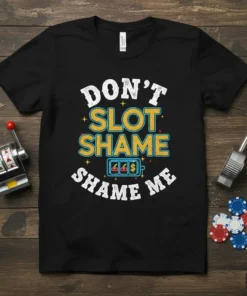 Don't Slot Shame Shame Me humorous quote on a black t-shirt, featuring slot machine graphics and bright colors