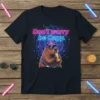 Don't worry be Capy. text with a cool capybara wearing sunglasses and drinking from a straw, surrounded by colorful cosmic