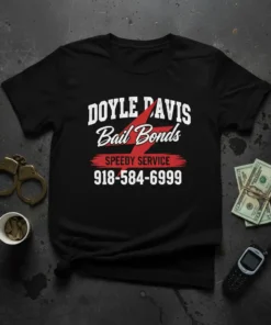 Black t-shirt with white text 'DOYLE DAVIS Bail Bonds SPEEDY SERVICE 918-584-6999' and a red lightning bolt graphic