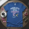 Drinking Coffee Watching Hummingbirds t-shirt with white and pink text and a hummingbird near a coffee cup with flowers