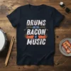 Drums Are The Bacon Of Music quote t-shirt with graphic of drumsticks and bacon strips