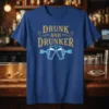 Drunk and Drunker quote with neon beer mugs graphic on a blue t-shirt
