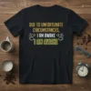 Black t-shirt with yellow text "DUE TO UNFORTUNATE CIRCUMSTANCES, I AM AWAKE I AM AWAKE" and coffee cup graphics