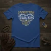 Blue t-shirt with "D'Wight'Man Tulsa King" text, crossed revolvers, and eagle graphic