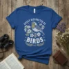 Easily Distracted By Birds quote with a detailed robin illustration on a royal blue t-shirt