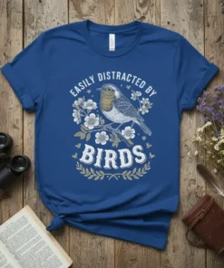 Easily Distracted By Birds quote with a detailed robin illustration on a royal blue t-shirt