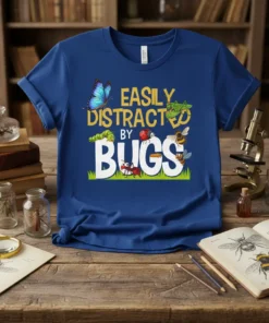 Easily Distracted By Bugs t-shirt with cartoon butterfly, caterpillar, ladybug, bee, ant, and grasshopper graphic