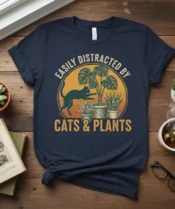 Vintage graphic tee with text "Easily Distracted By Cats & Plants" featuring a cat among potted plants
