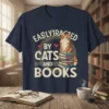 Easily Distracted by Cats and Books text with a cat sitting on books graphic