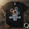 Black t-shirt with white text "Easily Distracted By Dice" and glowing polyhedral dice graphics