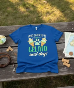 Blue t-shirt with text "Easily Distracted By Gelato and Dogs" featuring ice cream cones and a paw print graphic