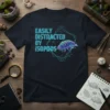 Easily Distracted By Isopods T-Shirt with neon-style text and a colorful isopod graphic