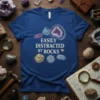 Easily Distracted By Rocks quote t-shirt featuring illustrations of various rocks and fossils