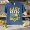 Easy Peasy Lemon Squeezy text design with a lemon graphic on a blue t-shirt