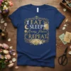 Eat Sleep Arrange Flowers Repeat text design with floral border and decorative elements on a navy t-shirt